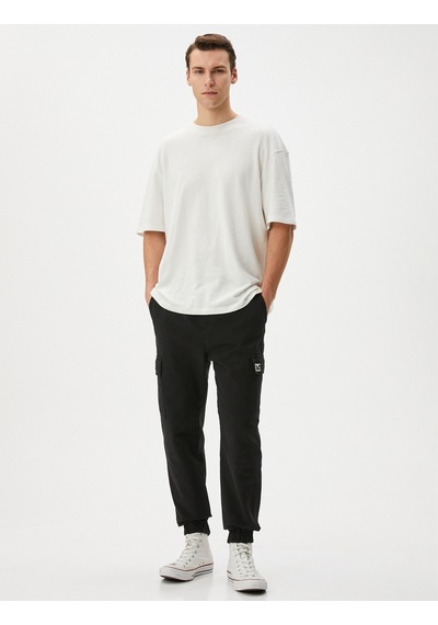Koton Jogger Pantolon Cep Detaylı Beli Bağcıklı Pamuklu Siyah 4sam40008hw 4SAM40008HW999 Siyah Koton Jogger Pantolon Cep Detaylı Beli Bağcıklı Pamuklu Siyah 4sam40008hw 4SAM40008HW999 Siyah
