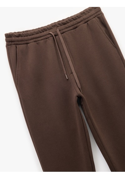 Koton Beli Bağcıklı Şardonlu Cep Detaylı Jogger Eşofman Altı Kahverengi 6wam40013mk Kahve Koton Beli Bağcıklı Şardonlu Cep Detaylı Jogger Eşofman Altı Kahverengi 6wam40013mk Kahve