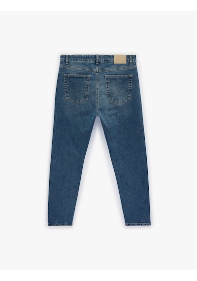 Koton Regular Fit Normal Bel Pamuklu Tapered Jean Pantolon - Joe Jean Orta İndigo 7wam40039nd Koton Regular Fit Normal Bel Pamuklu Tapered Jean Pantolon - Joe Jean Orta İndigo 7wam40039nd