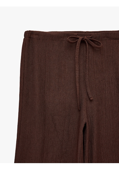 Koton Normal Bel Cepli Bağcıklı Geniş Paça Pantolon Kahverengi 6sal40130ık Kahve Koton Normal Bel Cepli Bağcıklı Geniş Paça Pantolon Kahverengi 6sal40130ık Kahve