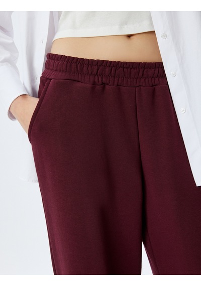 Koton Geniş Paça Beli Lastikli Cepli Şardonlu Rahat Kalıp Eşofman Altı Bordo 5wal40108ık Bordo Koton Geniş Paça Beli Lastikli Cepli Şardonlu Rahat Kalıp Eşofman Altı Bordo 5wal40108ık Bordo