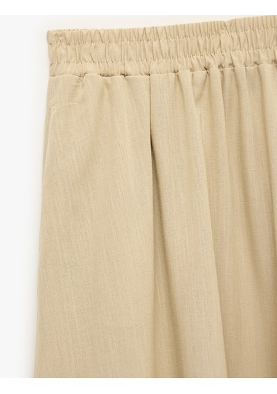 Koton Keten Görünümlü Beli Lastikli Loose Fit Kloş Etek Bej 6sak70241pw Ekru