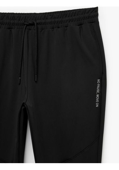 Koton Baskılı Paçası Lastikli Cepli Beli Bağcıklı Jogger Spor Eşofman Altı Siyah 7wam40077nk Koton Baskılı Paçası Lastikli Cepli Beli Bağcıklı Jogger Spor Eşofman Altı Siyah 7wam40077nk