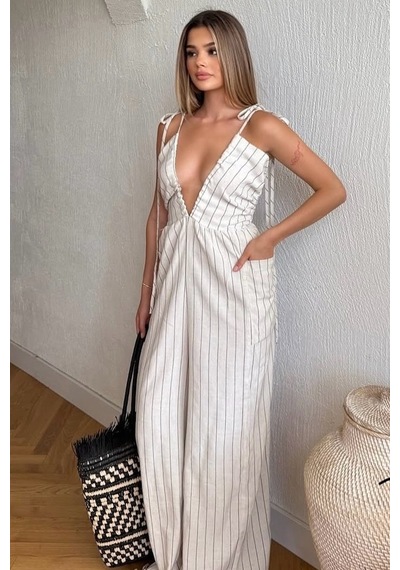 Dikey Çizgili Büyük Yan Cepli Bağlama Tasarım Keten Geniş Paça Uzun Pantolonlu Sırt Dekolte Tulum Ekru Dikey Çizgili Büyük Yan Cepli Bağlama Tasarım Keten Geniş Paça Uzun Pantolonlu Sırt Dekolte Tulum Ekru