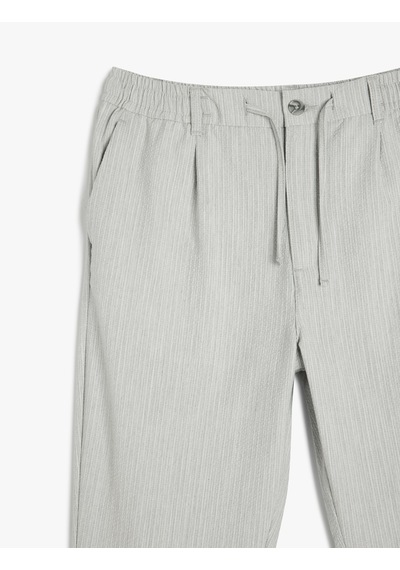 Koton Katlamalı Paça Viskon Karışımlı Düğmeli Beli Bağcıklı Slim Fit Pantolon Gri 5sam40034hw Gri Koton Katlamalı Paça Viskon Karışımlı Düğmeli Beli Bağcıklı Slim Fit Pantolon Gri 5sam40034hw Gri