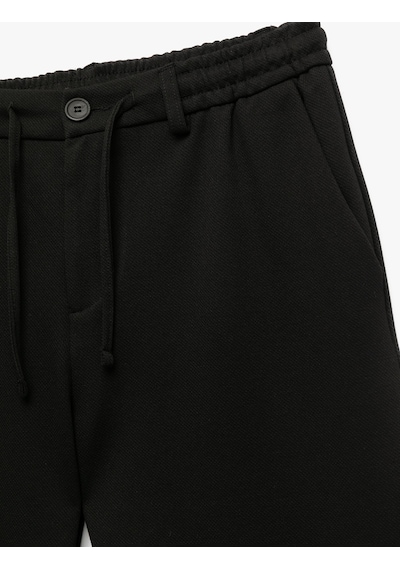 Koton Beli Bağcıklı Düğmeli Pike Kumaş Cep Detaylı Duble Paça Slim Fit Pantolon Siyah 6wam40012hk Siyah Koton Beli Bağcıklı Düğmeli Pike Kumaş Cep Detaylı Duble Paça Slim Fit Pantolon Siyah 6wam40012hk Siyah