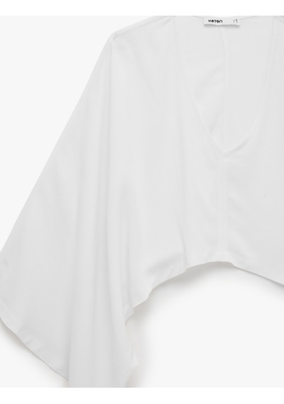 Koton Keten Karışımlı Geniş Yarasa Kol Asimetrik Kesim Dökümlü V Yaka Panço Crop Bluz Beyaz 6sak60022pw