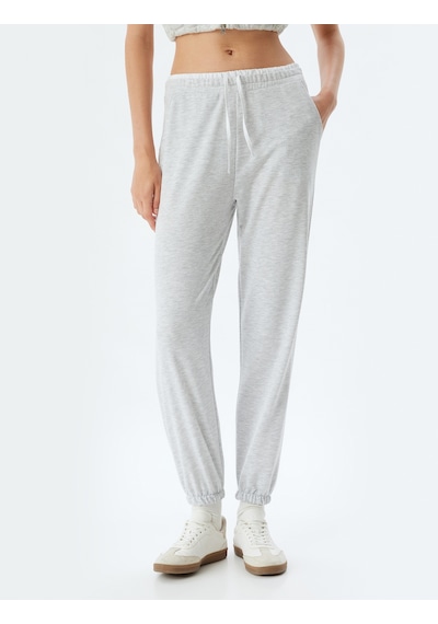 Koton Jogger Eşofman Altı Çift Bel Detaylı Bağcıklı Şardonlu Cepli Rahat Kalıp Kar Melanj 5wal40066ık Gri Melanj Koton Jogger Eşofman Altı Çift Bel Detaylı Bağcıklı Şardonlu Cepli Rahat Kalıp Kar Melanj 5wal40066ık Gri Melanj