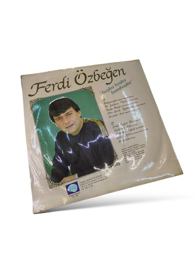 Ferdi Özbeğen Başka Başka Bambaşka Dönem Baskısı