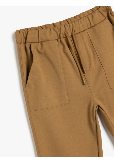 Koton Standart Bel Cepli Düğme Detaylı Basic Jogger Pantolon Deve Tüyü 5skb40058tw Taba