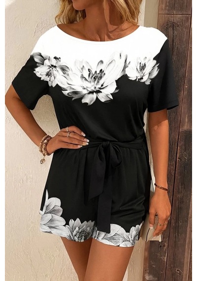 Defymoda Kadın Tek Omuzu Açık Çiçek Desenli Beli Kuşaklı Iki Iplik Mini Short Tulum Siyah