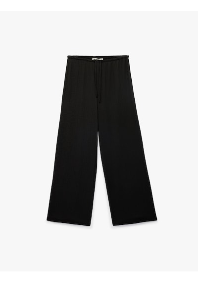 Koton Bürümcük Kumaş Beli Bağcıklı Düz Geniş Paça Pantolon Siyah 6sak40111ek