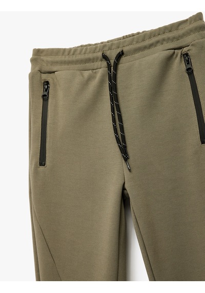 Koton Beli Bağlamalı Pamuklu Cepli Fermuar Detaylı Jogger Eşofman Altı Haki 7wkb40005tk