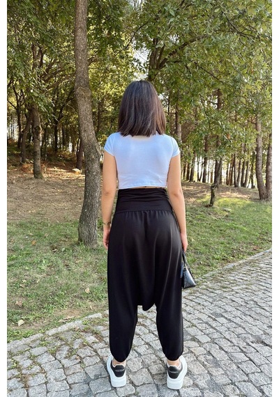 WeShaya Kadın Siyah Yüksek Bel, Paçası Lastikli, Salaş Örme Şalvar Pantolon Siyah WeShaya Kadın Siyah Yüksek Bel, Paçası Lastikli, Salaş Örme Şalvar Pantolon Siyah