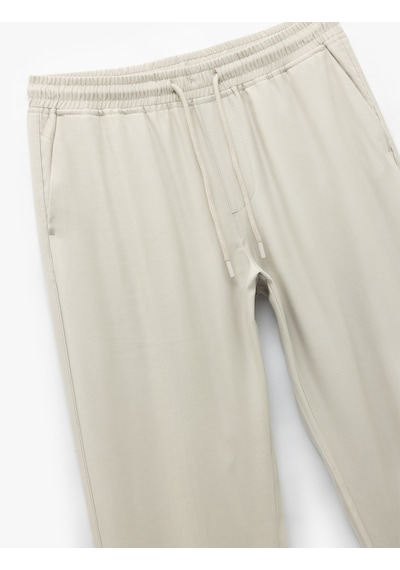 Koton Viskon Cep Detaylı Rayon Tapered Beli Bağcıklı Eşofman Pantolon Gri 5sam40010hw Gri