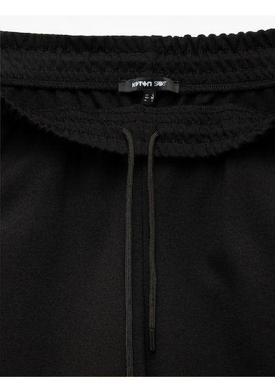 Koton Viskon Karışımlı Beli Bağcıklı Baskılı Bermuda Oversize Spor Şort Siyah 5sam40023nk Siyah Koton Viskon Karışımlı Beli Bağcıklı Baskılı Bermuda Oversize Spor Şort Siyah 5sam40023nk Siyah