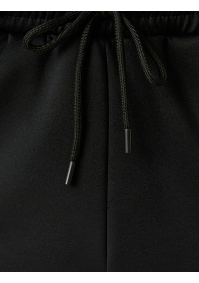 Koton Beli Bağcıklı Cep Detaylı Jogger Scuba Kumaş Spor Eşofman Altı Siyah 5wam40021nk Siyah Koton Beli Bağcıklı Cep Detaylı Jogger Scuba Kumaş Spor Eşofman Altı Siyah 5wam40021nk Siyah