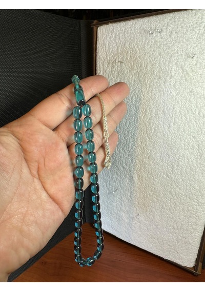 Ateş Kehribar Tesbih Kapsül Kesim 7 X 11mm Şeffaf/mavi T-257