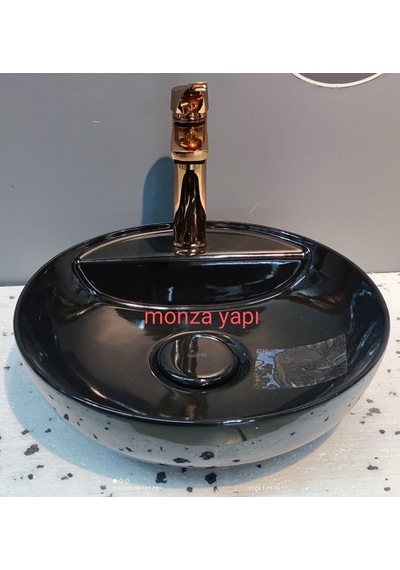 tezgah üstü 42 cm  lavabo batarya delikli parlak siyah