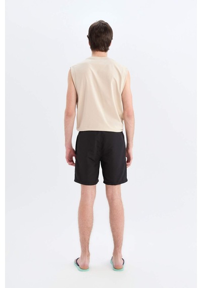 DeFacto Regular Fit Kısa Boy Cepli File Astarlı Beli Bağcıklı Düz Hafif Kumaş Deniz Şortu E5133AXNSBK27 DeFacto Regular Fit Kısa Boy Cepli File Astarlı Beli Bağcıklı Düz Hafif Kumaş Deniz Şortu E5133AXNSBK27