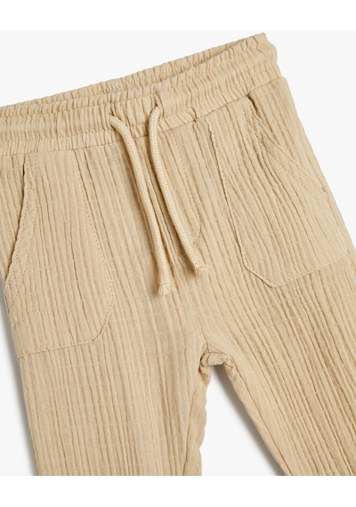 Koton Jogger Pantolon Cep Detaylı Beli Lastikli Dokulu Bej 4smb40011tw 4SMB40011TW054 Ekru