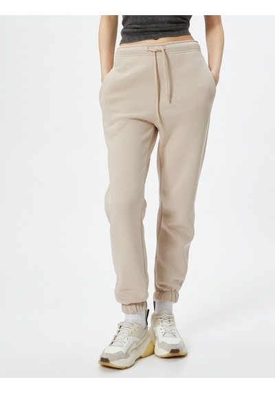 Koton Jogger Eşofman Altı Beli Lastikli Bağcıklı Cep Detaylı Bej 4wal40002ık 4WAL40002IK057 Ekru Koton Jogger Eşofman Altı Beli Lastikli Bağcıklı Cep Detaylı Bej 4wal40002ık 4WAL40002IK057 Ekru
