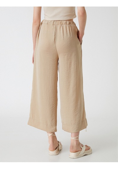 Koton Crop Pantolon Bol Paça Beli Bağlamalı Saten Görünümlü Taş 2sak40119pw Taş