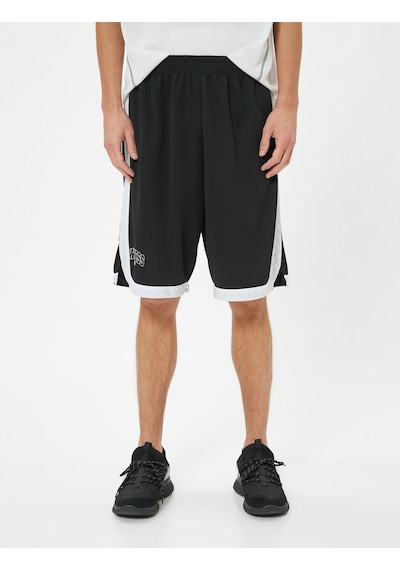 Koton Spor Şort Oversize Slogan Baskılı Beli Lastikli Çizgi Detaylı Siyah 4sam40036nk Siyah Koton Spor Şort Oversize Slogan Baskılı Beli Lastikli Çizgi Detaylı Siyah 4sam40036nk Siyah
