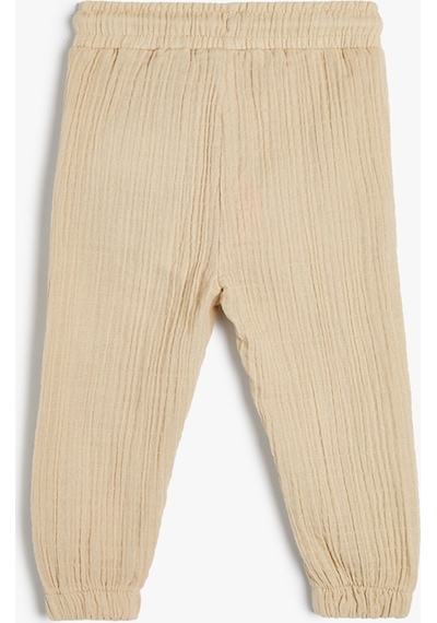 Koton Jogger Pantolon Cep Detaylı Beli Lastikli Dokulu Bej 4smb40011tw 4SMB40011TW054 Ekru