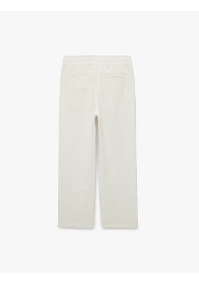 Koton Regular Fit Pamuklu Cepli Beli Bağcıklı Lastikli Pantolon Beyaz 7wam40050hw