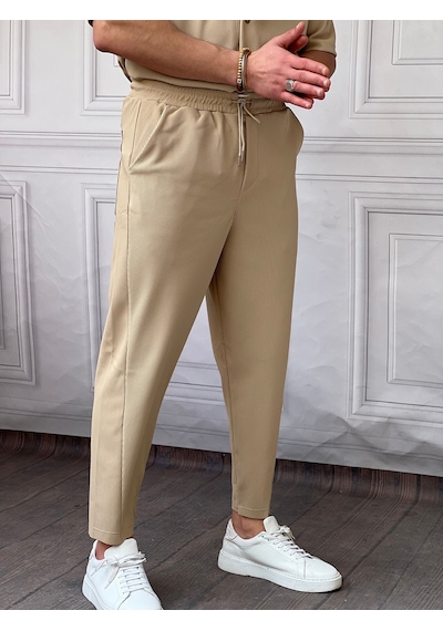 Modefendi Asimetrik Paça Jogger Pantolon Krem