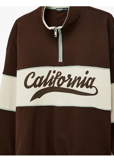Koton Oversize Şardonlu Renk Bloklu Kolej Baskılı Yarım Fermuarlı Sweatshirt Kahverengi 6wam70034mk Kahverengi