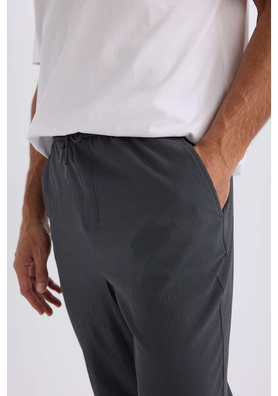 DeFacto Relax Fit Rahat Kesim Düz Paça Krinkıl Yazlık Kumaş Pantolon C3930AX25SPAR15