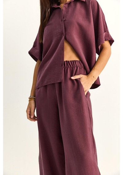 Shade Kadın Oversize Kısa Kol Gömlek Beli Lastikli Geniş Paça Pantolon Takım 7651 60286138 - Mürdüm Shade Kadın Oversize Kısa Kol Gömlek Beli Lastikli Geniş Paça Pantolon Takım 7651 60286138 - Mürdüm