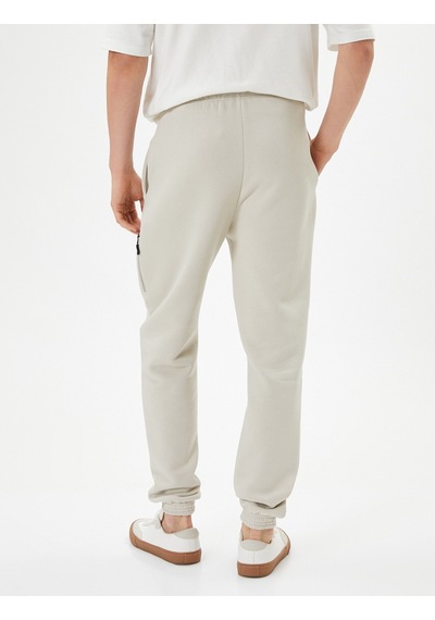 Koton Jogger Eşofman Altı Beli Bağcıklı Fermuar Detaylı Cepli Bej 4sam40038mk 4SAM40038MK050 Ekru Koton Jogger Eşofman Altı Beli Bağcıklı Fermuar Detaylı Cepli Bej 4sam40038mk 4SAM40038MK050 Ekru