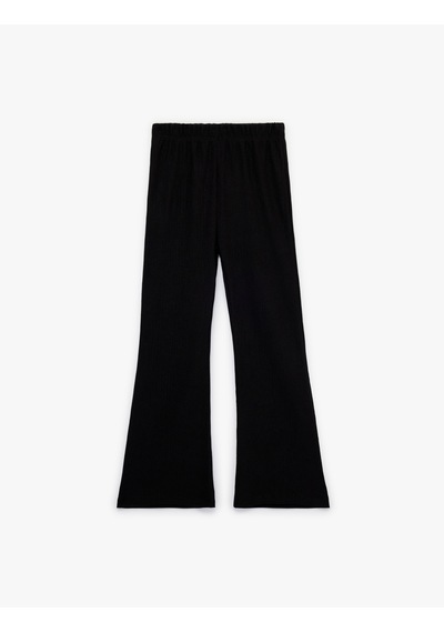 Koton Bürümcük Kumaş Beli Lastikli İspanyol Paça Pantolon Siyah 6skg40015ak Siyah Koton Bürümcük Kumaş Beli Lastikli İspanyol Paça Pantolon Siyah 6skg40015ak Siyah
