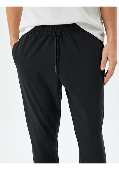 Koton Beli Bağcıklı Cep Detaylı Jogger Spor Eşofman Altı Siyah 5sam40041nk Siyah Koton Beli Bağcıklı Cep Detaylı Jogger Spor Eşofman Altı Siyah 5sam40041nk Siyah