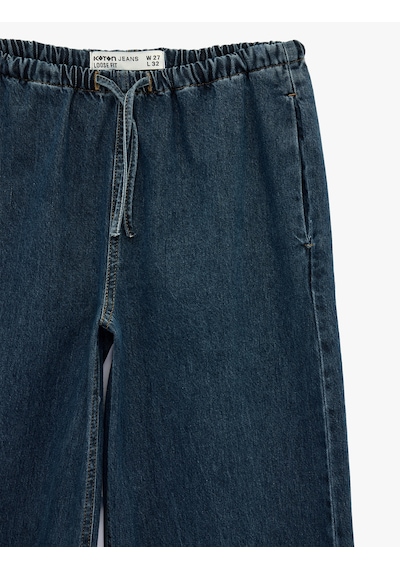 Koton Beli Bağcıklı Cep Detaylı Bol Paça Denim Pantolon Koyu İndigo 6sal40041md Indigo