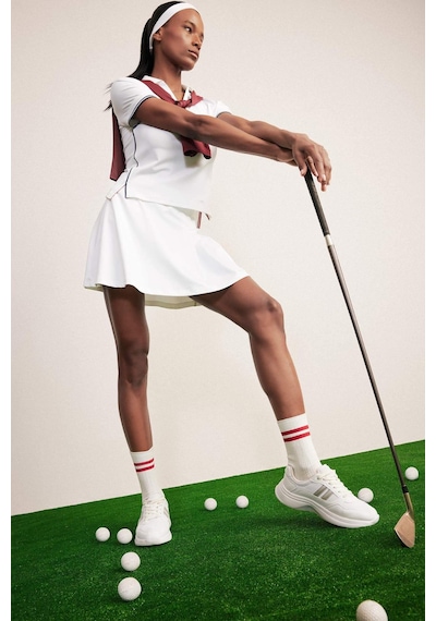 DeFactoFit Standart Fit Pileli İçi Taytlı Mini Tenis Eteği D9317AX25SPWT34 Beyaz