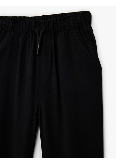 Koton Beli Bağcıklı Viskon Karışımlı Jogger Pantolon Siyah 6skb40120tw Koton Beli Bağcıklı Viskon Karışımlı Jogger Pantolon Siyah 6skb40120tw