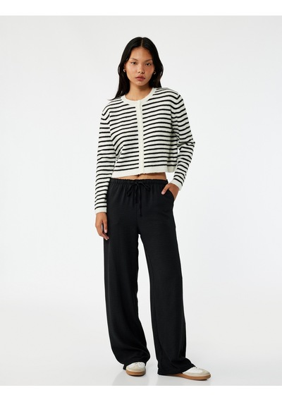 Koton Rahat Kalıp Cep Detaylı Beli Bağcıklı Aerobin Kumaş Geniş Paça Pantolon Siyah 6wal40007ıw Siyah Koton Rahat Kalıp Cep Detaylı Beli Bağcıklı Aerobin Kumaş Geniş Paça Pantolon Siyah 6wal40007ıw Siyah