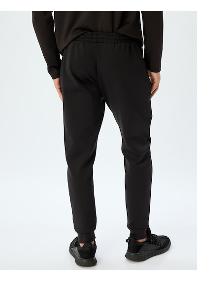 Koton Spor Eşofman Altı Jogger Beli Bağcıklı Fermuarlı Cep Detaylı Siyah 5wam40013nk Siyah Koton Spor Eşofman Altı Jogger Beli Bağcıklı Fermuarlı Cep Detaylı Siyah 5wam40013nk Siyah