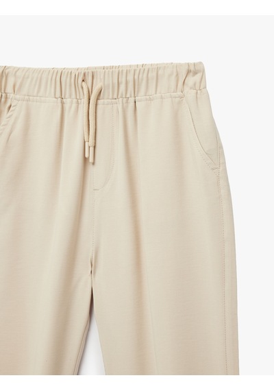 Koton Beli Bağcıklı Viskon Karışımlı Jogger Pantolon Bej 6skb40120tw Ekru