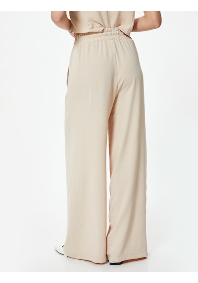 Koton Dökümlü Palazzo Pantolon Beli Lastikli Bağlamalı Cepli Bej 4sak40260pw Ekru