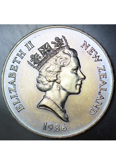 Yeni Zelanda 1 Dolar 1986 Hatıra-ıı. Elizabeth Ziyareti. 40.000 Basılmıştır. 38,6 Mm 28,3 Gr. Çil -