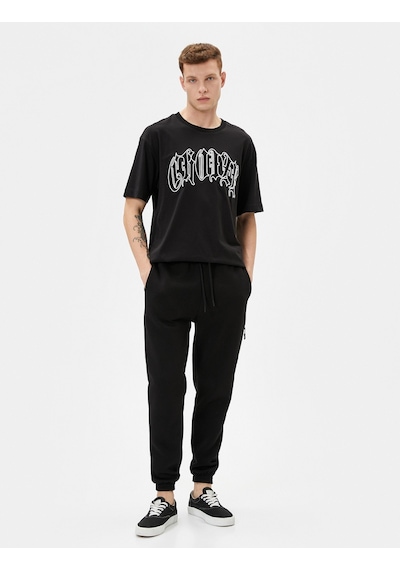 Koton Jogger Eşofman Altı Beli Bağcıklı Fermuar Detaylı Cepli Siyah 4sam40038mk 4SAM40038MK999 Siyah Koton Jogger Eşofman Altı Beli Bağcıklı Fermuar Detaylı Cepli Siyah 4sam40038mk 4SAM40038MK999 Siyah