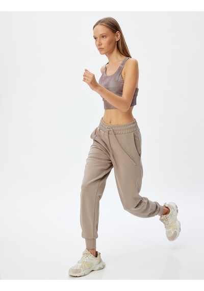 Koton Jogger Eşofman Altı Yüksek Bel Bağcıklı Cepli Dikiş Detaylı Modal Karışımlı Vizon 5wak40096nk Vizon Koton Jogger Eşofman Altı Yüksek Bel Bağcıklı Cepli Dikiş Detaylı Modal Karışımlı Vizon 5wak40096nk Vizon