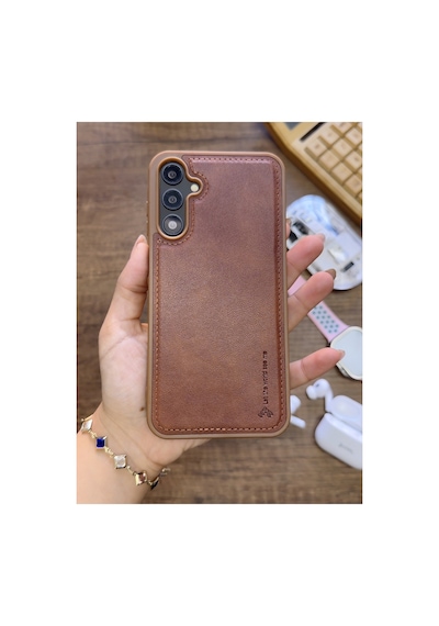 Samsung Galaxy S25 Uyumlu Premium Deri Dokulu Darbelere Karşı Dayanıklı Nazal Silikon Kılıf Kahverengi Samsung Galaxy S25 Uyumlu Premium Deri Dokulu Darbelere Karşı Dayanıklı Nazal Silikon Kılıf Kahverengi