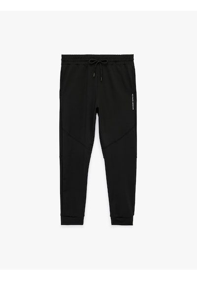 Koton Baskılı Lastikli Paça Cepli Beli Bağcıklı Jogger Spor Eşofman Altı Siyah 6sam40081nk Koton Baskılı Lastikli Paça Cepli Beli Bağcıklı Jogger Spor Eşofman Altı Siyah 6sam40081nk