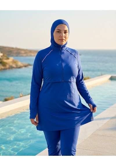 Pierre Cardin Büyük Beden Dik Yaka Yarım Fermuarlı Midi El Dar Paça Likralı Çift Boneli Tesettür Mayo Saks Pierre Cardin Büyük Beden Dik Yaka Yarım Fermuarlı Midi El Dar Paça Likralı Çift Boneli Tesettür Mayo Saks